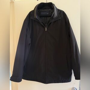 Weatherproof Black Raincoat with High Collar and Weather-Resistant Fabric